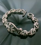 Quarter Cross Oval With Crown & 9 Quarter Skull Links Bracelet