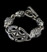 Sculpted Oval With 2 Lions & 2Skulls Bracelet