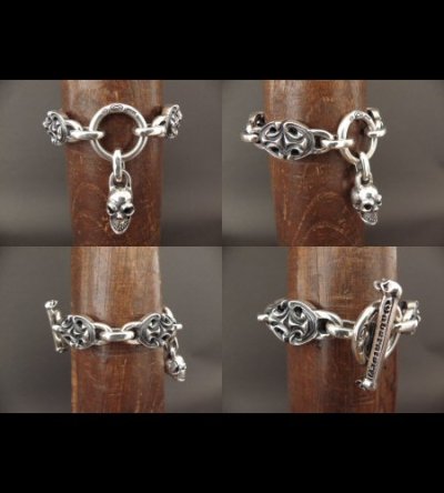 Photo4: All Sculpted Oval Links & Skull Drops Bracelet