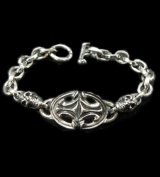 Quarter Sculpted Oval ID With 2Skulls & Small Oval Links Bracelet