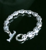 Quarter 11 Slant Head Skull Links Bracelet