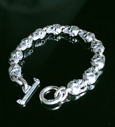 Photo1: Quarter 11 Slant Head Skull Links Bracelet