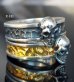 Photo17: Twelve Small Skull On 7.5mm Wide Side Flat Chiseled Reel Ring