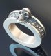 Photo1: Twelve Small Skull On 7.5mm Wide Side Flat Chiseled Reel Ring (1)